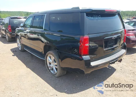 2017 Chevrolet Suburban Premier z USA, uszkodzony, nr VIN 1GNSCJKC0HR269840
